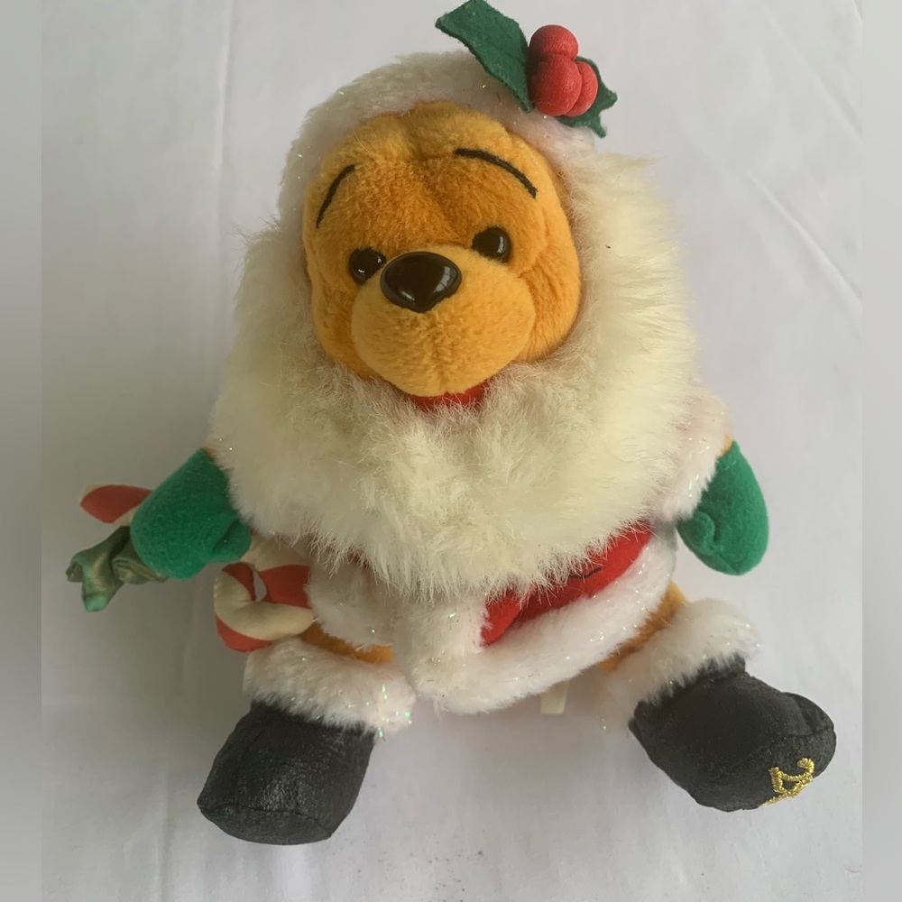 Holiday Pooh dressed as Santa